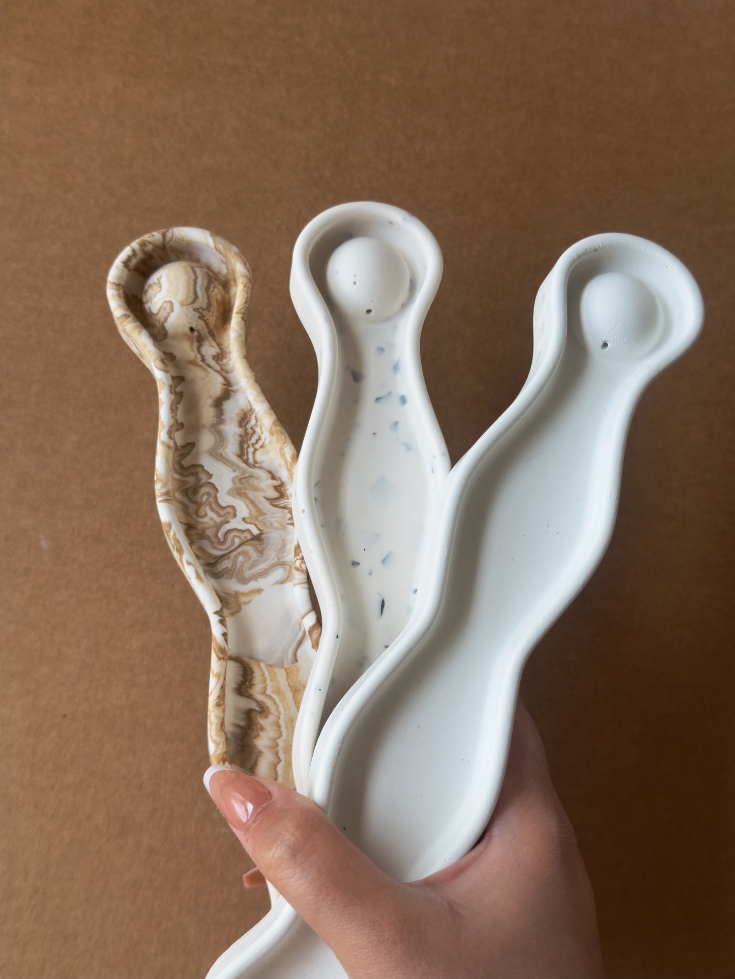 Wavy incense stick holder